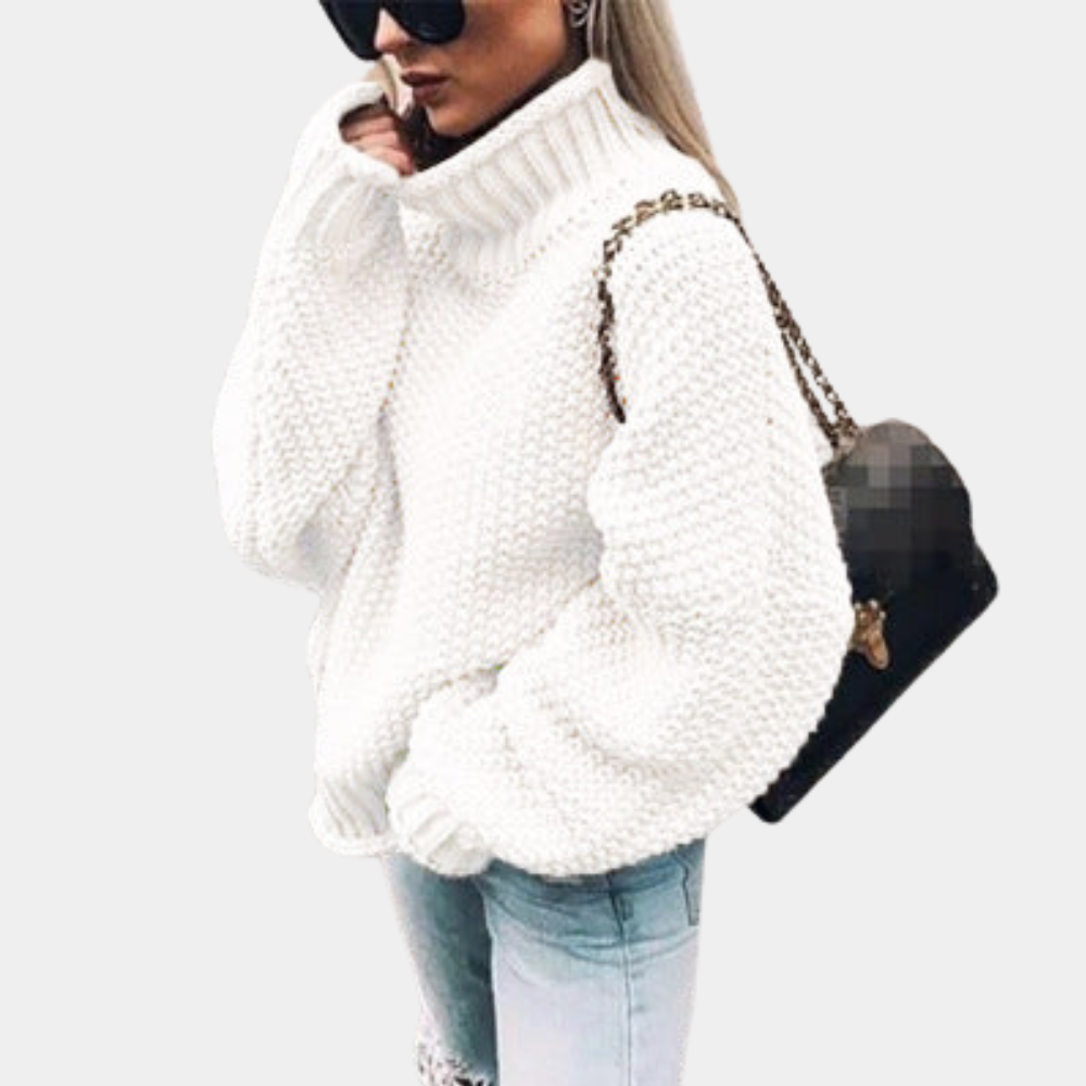 Damski sweter oversize z golfem, idealny na zimę. Stylowy, komfortowy i ciepły element odzieży casual.