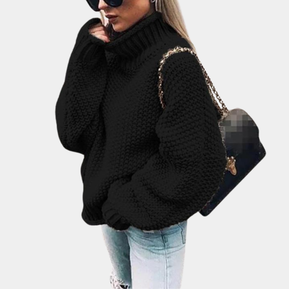 Modny, damski sweter oversize z golfem. Stylowy design i ciepło sprawiają, że to idealna odzież zimowa.