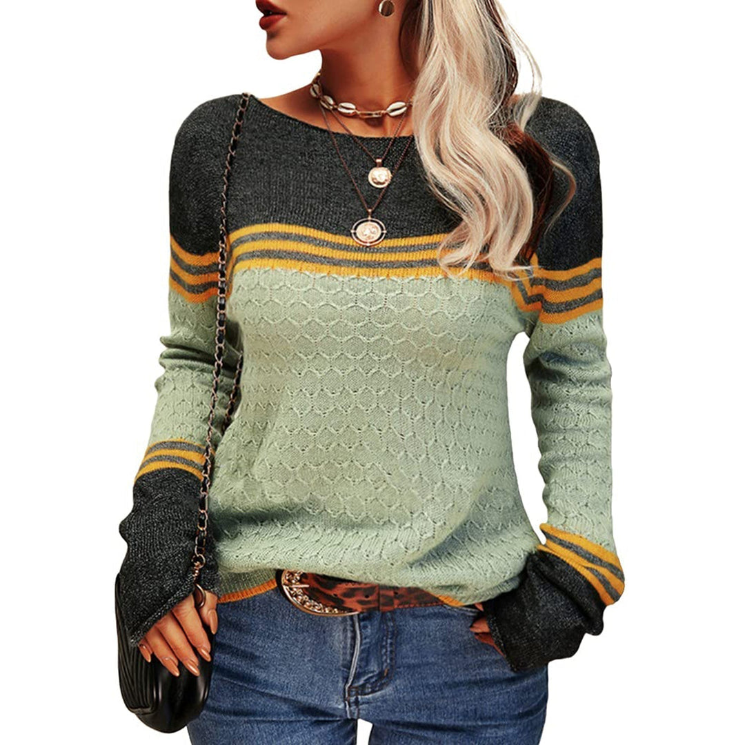 Uniwersalny sweter damski w paski, pasuje do stylizacji casualowych i eleganckich.