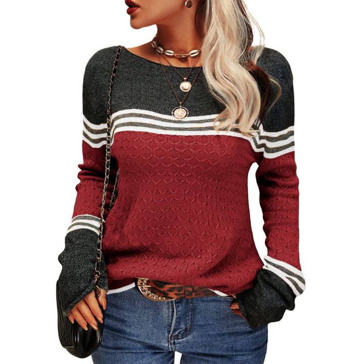 Jesienny sweter damski w modne paski, stylowy dodatek do garderoby casual.