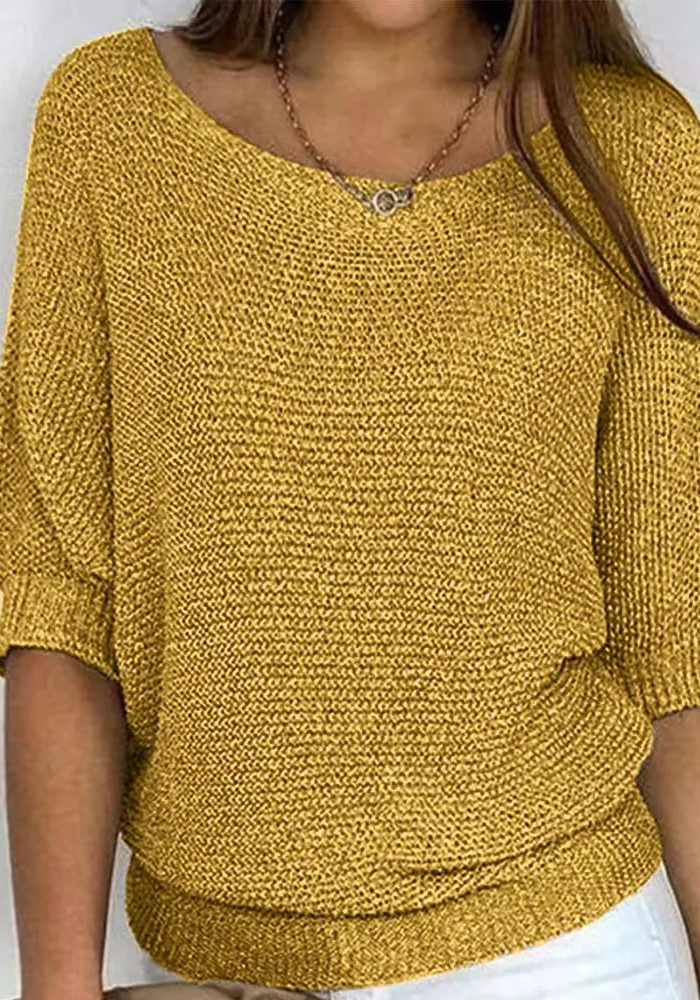 Wygodny sweter damski dekolt łódka, rękaw do łokcia. Stylowy, luźny fason do codziennych stylizacji.