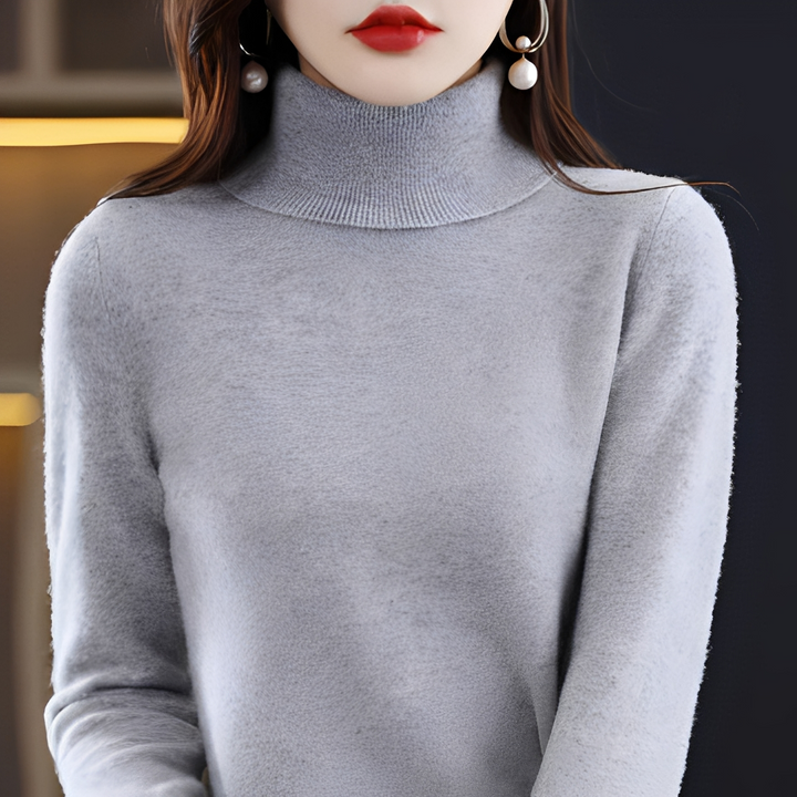 Stylowy sweter damski z golfem. Ciepły i elegancki, idealny na zimę. Modna odzież dla kobiet.