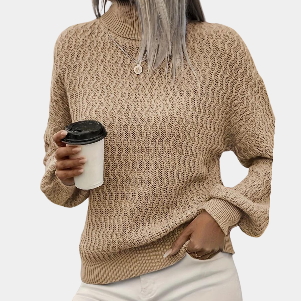 Elegancki damski sweter z golfem, dostępny w morelowym lub kawowym kolorze. Modny fason na jesień i zimę, pełen komfortu.