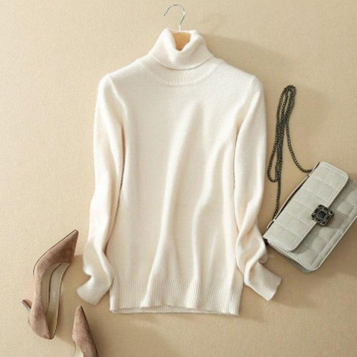 Elegancki damski sweter z golfem, ciepły, komfortowy, ze ściągaczami. Idealny na zimę, casualowy look.