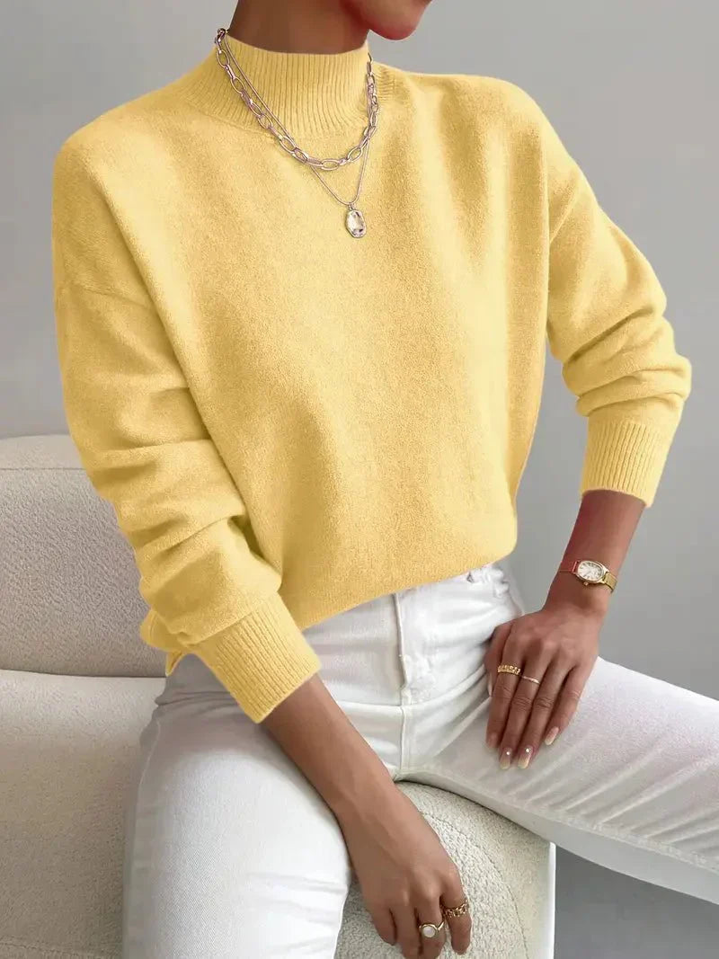 Modny sweter damski z okrągłym dekoltem, doskonały do biura. Elegancki i wygodny element odzieży damskiej.
