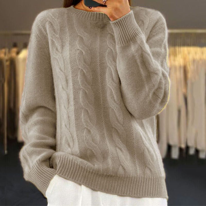 Elegancki sweter damski Gabriela, modny dodatek do stylizacji jesienno-zimowych. Ciepły i pleciony fason.