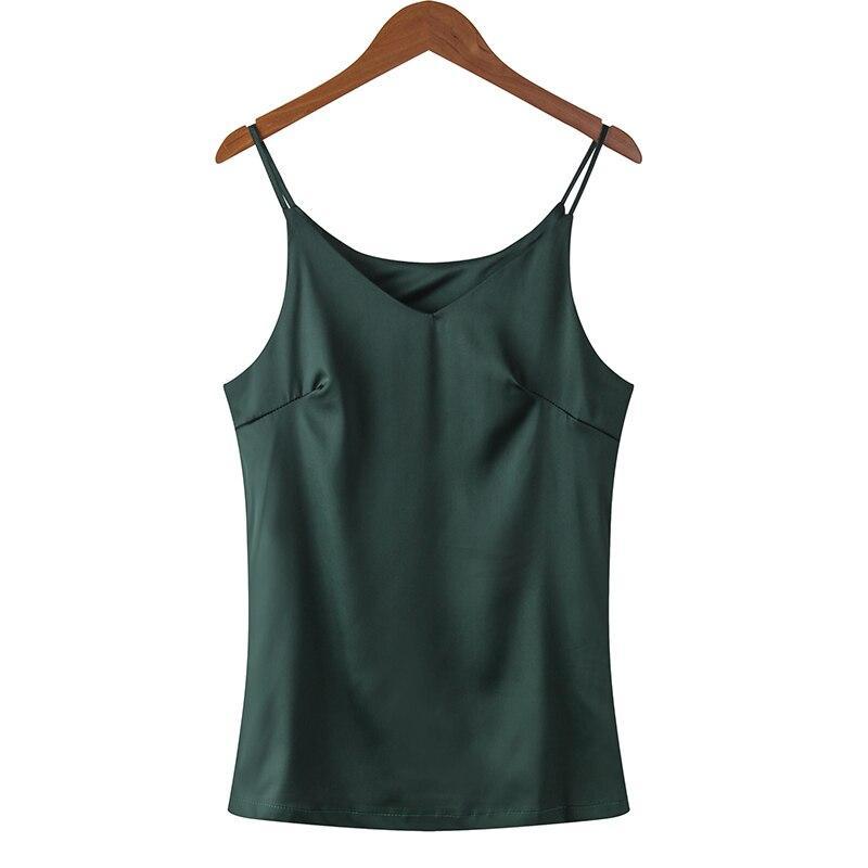 Casualowy tank top damski bez rękawów z dekoltem V. Jednokolorowy, luźny krój na letnie dni.