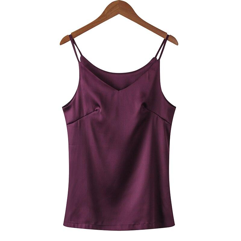 Jednokolorowy tank top damski z luźnym krojem. Elegancki dekolt V i cienkie ramiączka. Koszulka bez rękawów.