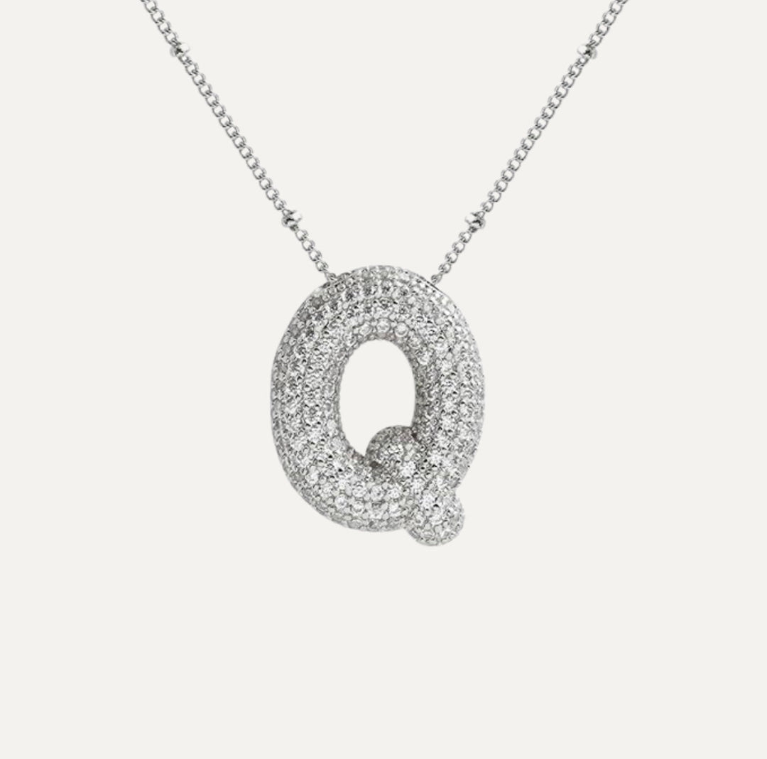 Złoty naszyjnik damski z błyszczącymi diamentami, personalizowana biżuteria.