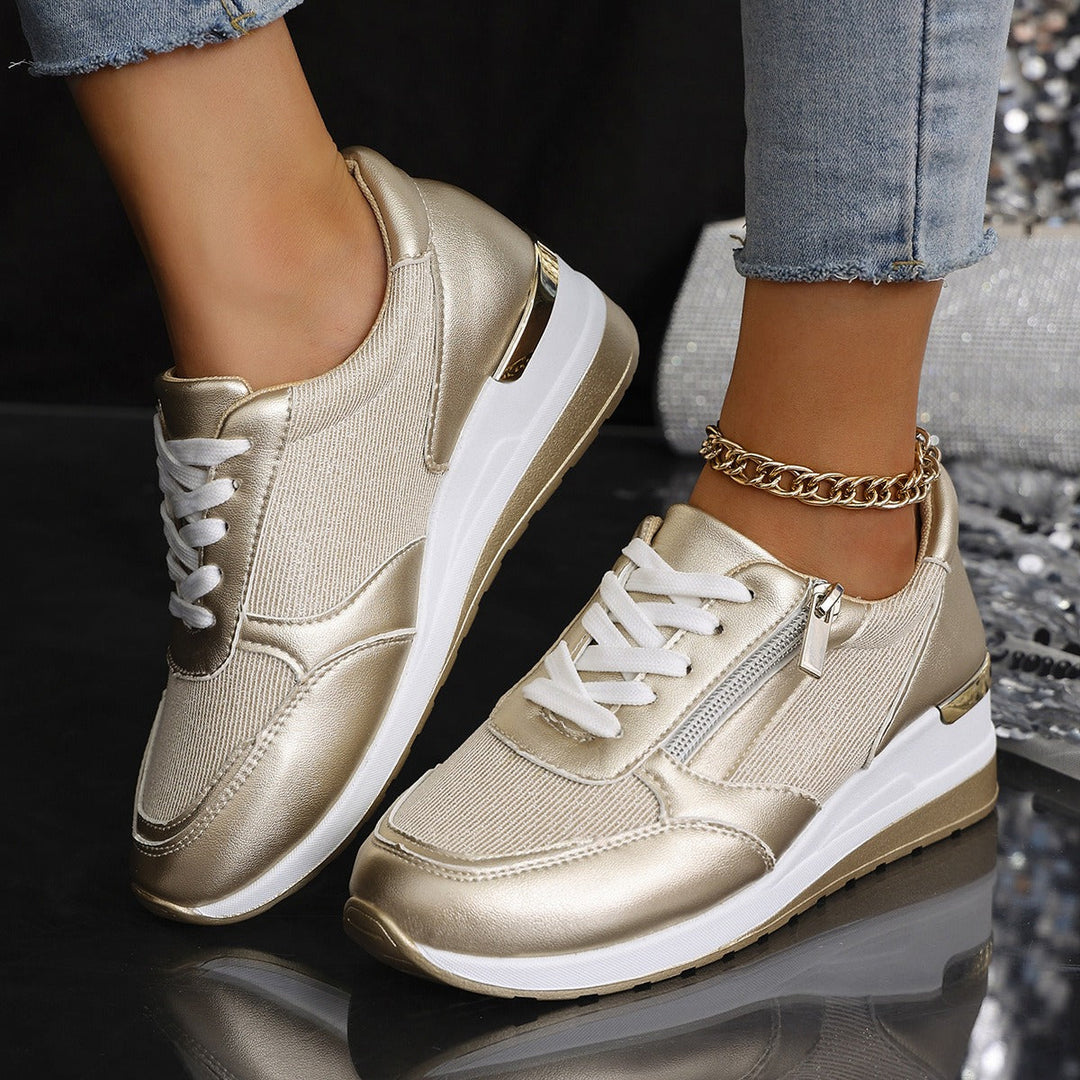Stylowe sneakersy damskie, błyszczące, na platformie, doskonałe do casualowych stylizacji. Dostępne w modnych kolorach.