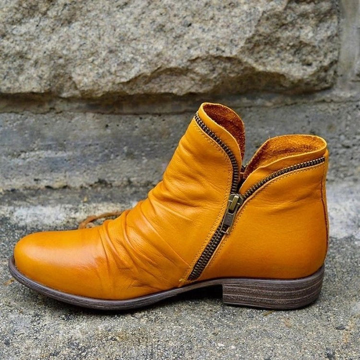 Eleganckie botki damskie ze skóry ekologicznej z zamkiem, idealne obuwie jesienne do casualowych stylizacji.