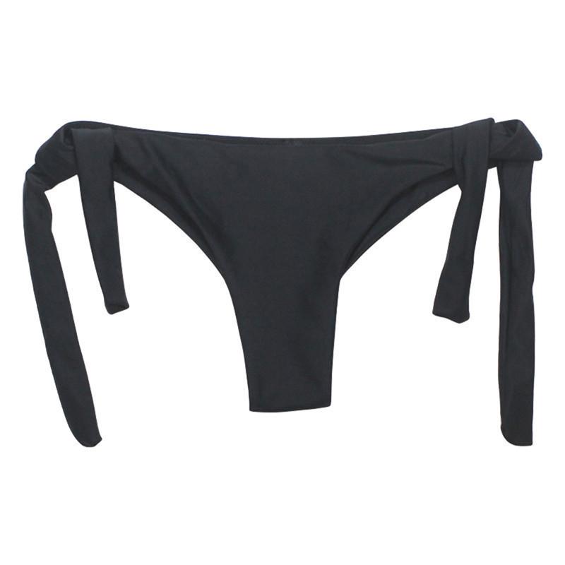 Damskie figi bikini wiązane po bokach. Komfortowe i stylowe, idealne na plażę i basen.