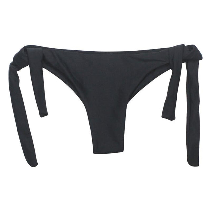 Damskie figi bikini wiązane po bokach. Komfortowe i stylowe, idealne na plażę i basen.