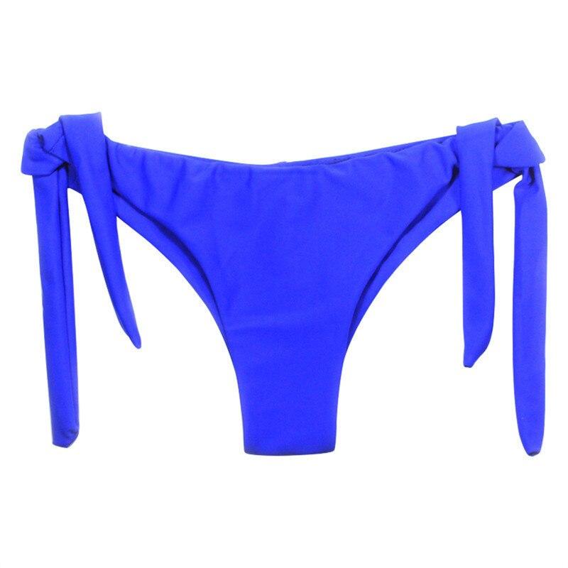 Damskie figi bikini z wiązaniami, zapewniające komfort i swobodę ruchu. Idealne na wakacje.