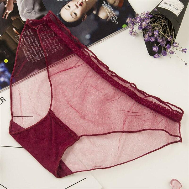 Damskie figi bikini transparentne z koronkowymi detalami, idealne do noszenia na co dzień.