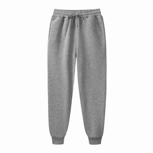 Damskie gładkie spodnie dresowe z dzianiny, mid-waist, idealne na co dzień.