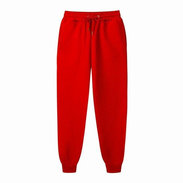 Damskie spodnie dresowe casualowe, minimalistyczny design, wysoki komfort noszenia.