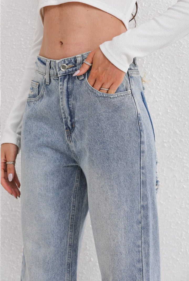 Uniwersalne jeansy damskie Mom Fit, wysoki stan, modny design, idealne do letnich i wiosennych stylizacji.