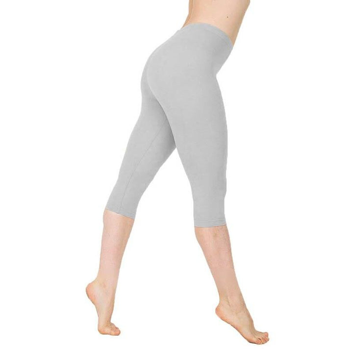 Komfortowe damskie legginsy treningowe 3/4 z wysokim stanem, do jogi i na fitness. Gładki materiał.