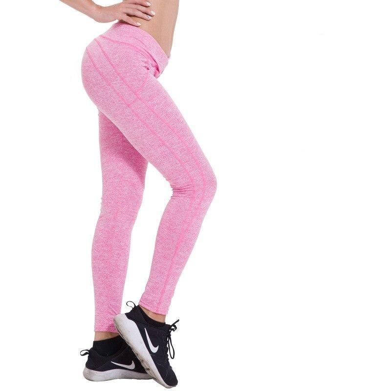 Komfortowe legginsy damskie z wysokim stanem, idealne do treningu. Modne, elastyczne, z efektem push up.