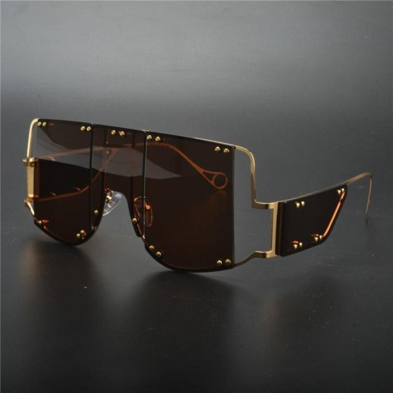Modne damskie okulary przeciwsłoneczne, prostokątne. Futurystyczny design idealny na słoneczne dni.
