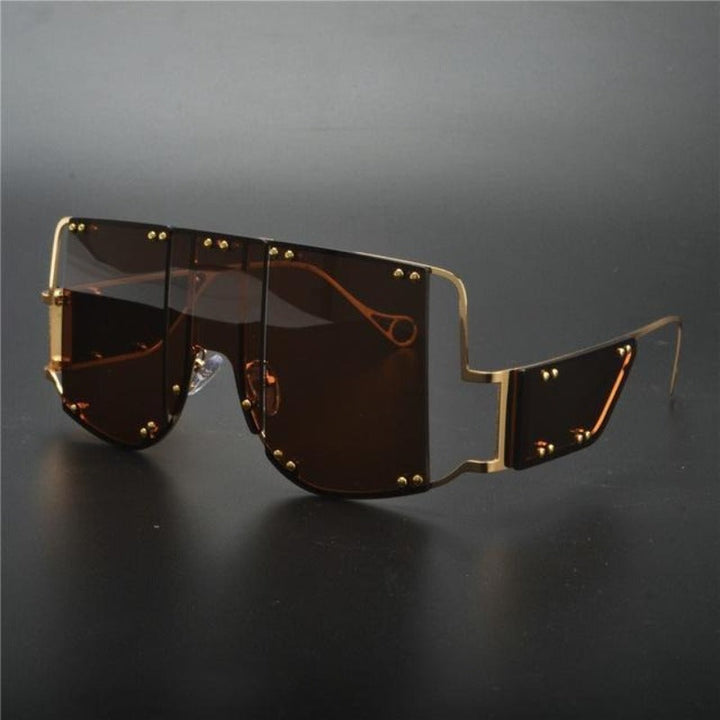 Modne damskie okulary przeciwsłoneczne, prostokątne. Futurystyczny design idealny na słoneczne dni.