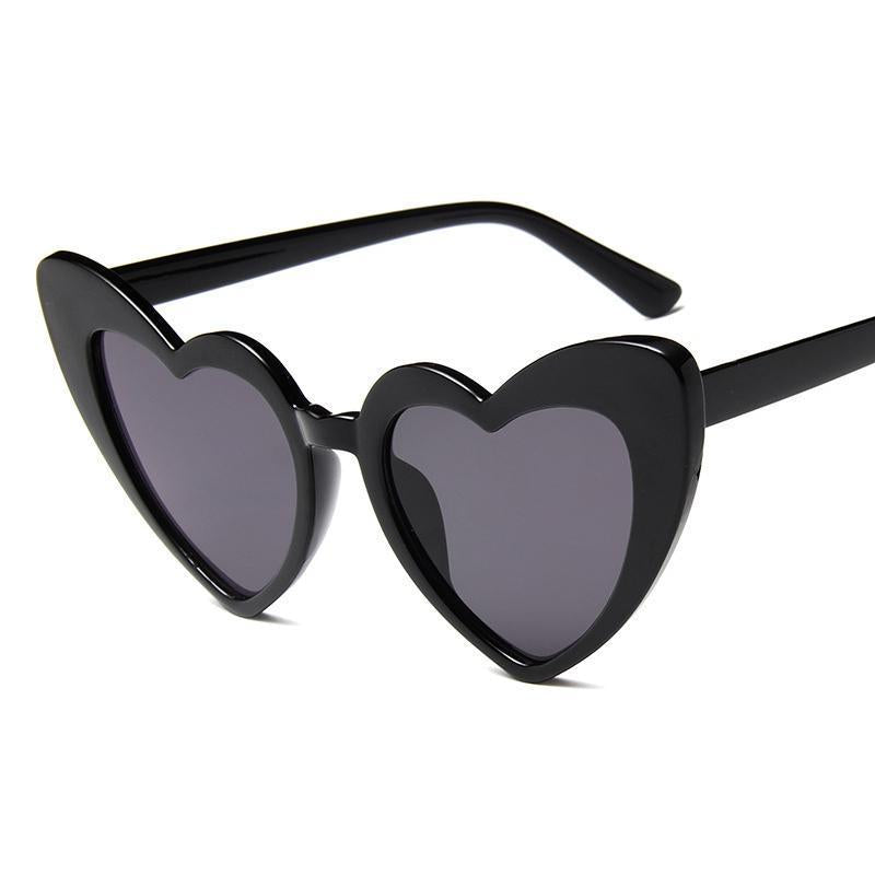Stylowe damskie okulary przeciwsłoneczne w serca, ochrona UV, design retro.