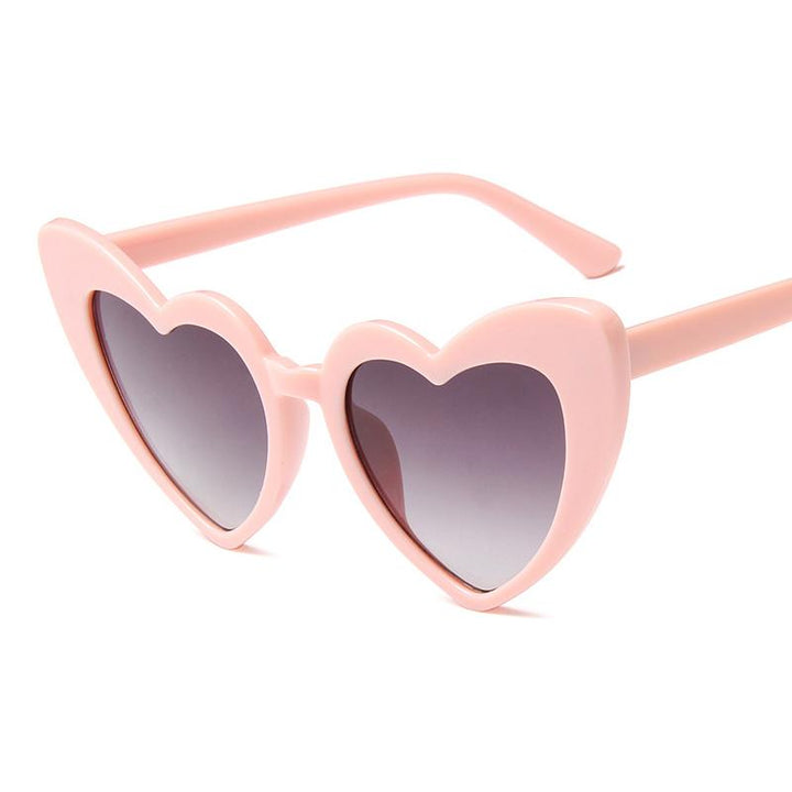 Unikalne damskie okulary przeciwsłoneczne serca w stylu retro, podkreślające styl.