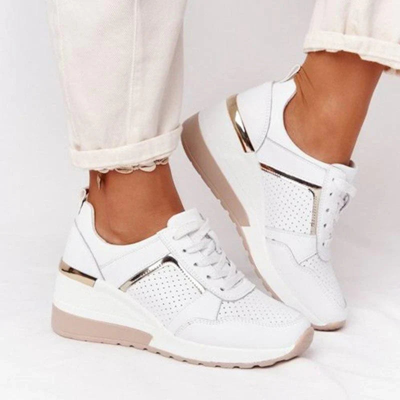 Damskie ortopedyczne sneakersy na koturnie, zapewniające komfort i wsparcie dla stóp przez cały dzień.