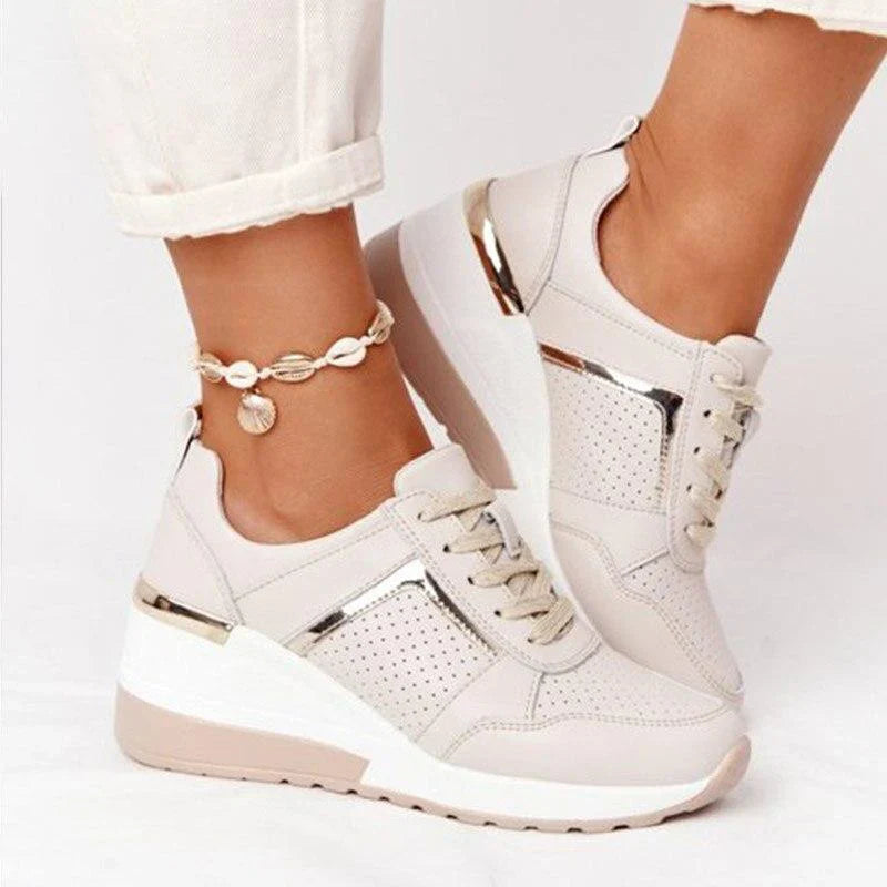 Eleganckie białe sneakersy damskie na koturnie, obuwie ortopedyczne dla maksymalnego komfortu.