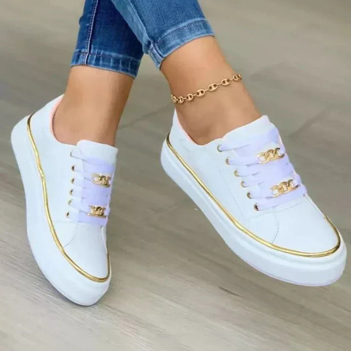 Stylowe damskie sneakersy na platformie z ortopedyczną wkładką, zapewniające wygodę. Idealne modne obuwie na co dzień.