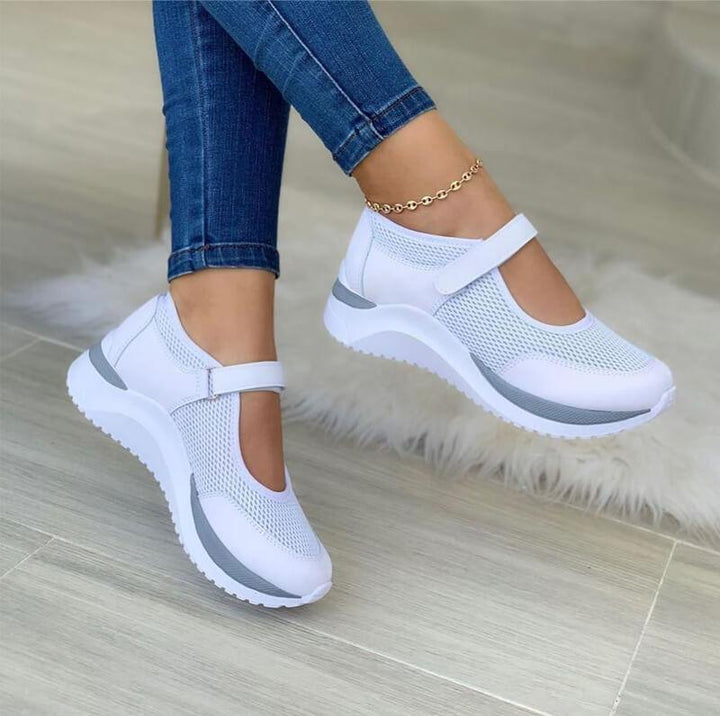 Stylowe damskie sneakersy na rzep, zapewniające komfort i wsparcie ortopedyczne, idealne do codziennych stylizacji.