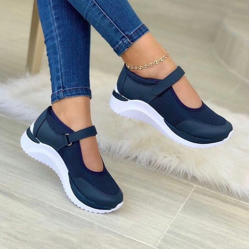 Damskie sneakersy ortopedyczne z zapięciem na rzep, zapewniające maksymalny komfort i oddychalność podczas noszenia.