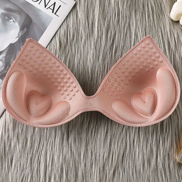 Innowacyjne podwójne wkładki push-up, które dyskretnie powiększają i podnoszą biust, idealne do damskiej bielizny.
