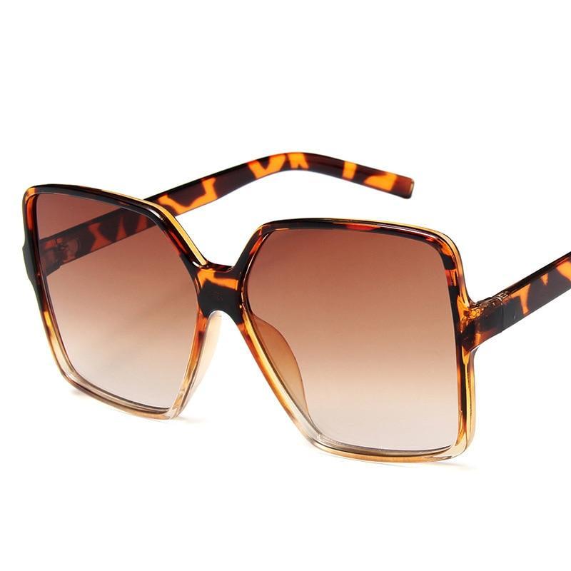 Eleganckie damskie okulary prostokątne. Przeciwsłoneczne, zapewniające 100% ochronę UV.
