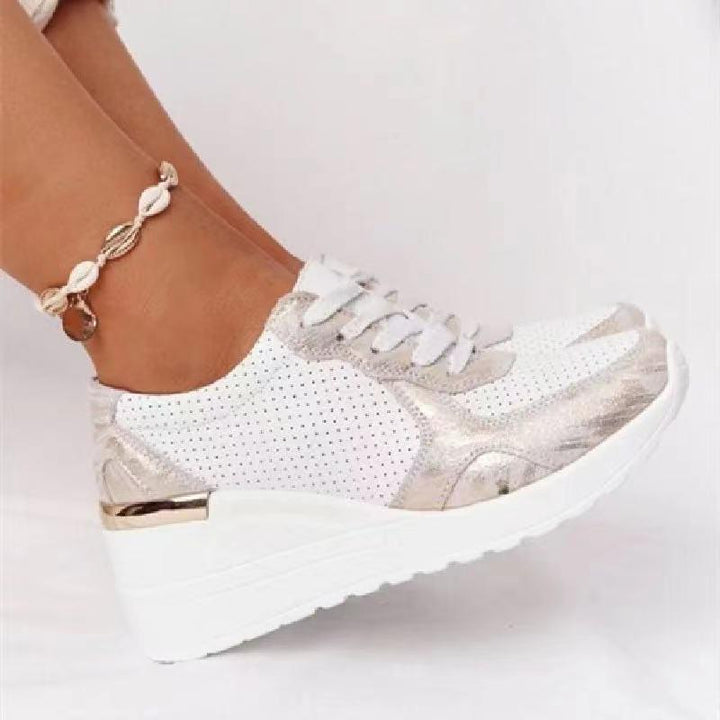 Profil damskich sneakersów z amortyzującą, elastyczną podeszwą. Wygodne i modne buty.