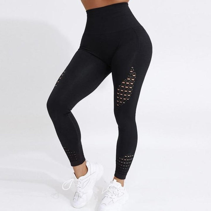 Damskie sportowe legginsy z wycięciem, idealne na trening, fitness i jogę. Wysoki stan, oddychające.