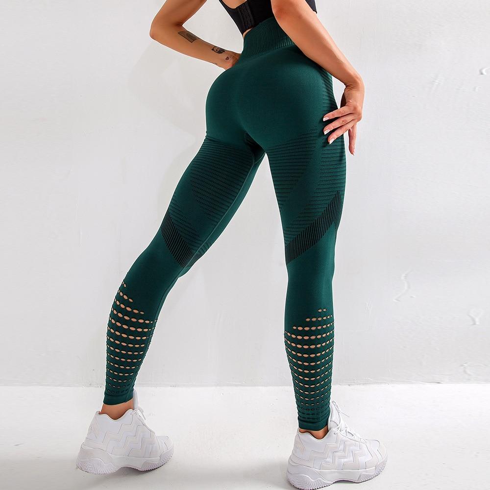 Oddychające legginsy damskie fitness z wycięciami. Wysoki stan, szybkoschnące, idealne na siłownię.