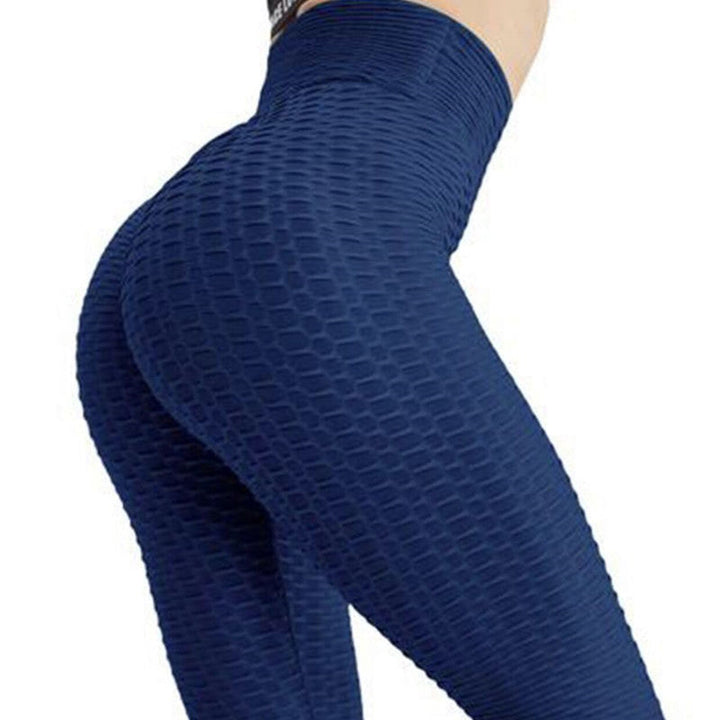 Elastyczne legginsy damskie sportowe, wysoki stan, tłoczone, idealne do ćwiczeń i relaksu.