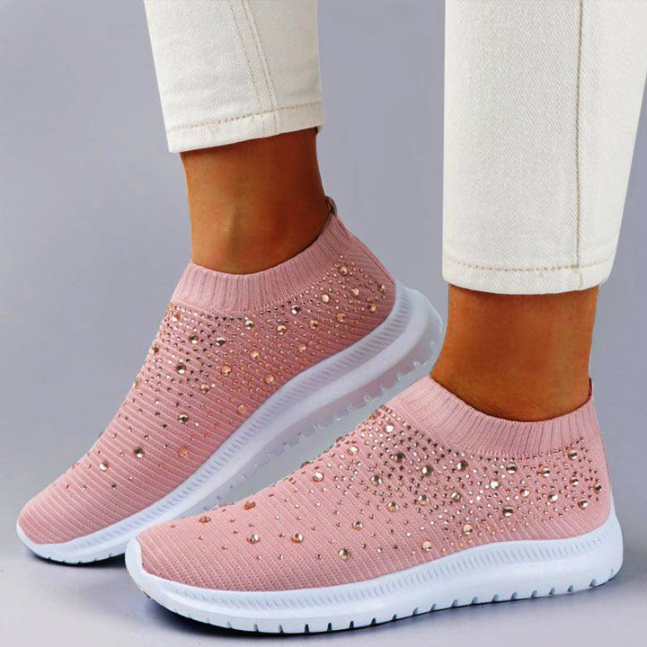 Damskie wsuwane sneakersy ortopedyczne w kolorze białym, idealne na co dzień, zapewniające komfort i wsparcie stopy.