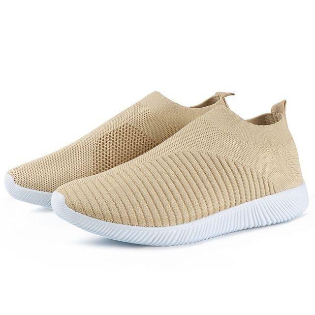 Sneakersy damskie ortopedyczne, wsuwane, białe, z przewiewnego materiału. Idealne dla aktywnych kobiet.