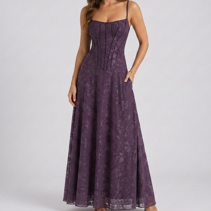 Elegancka sukienka maxi z gorsetem i odkrytymi plecami w kwiatowy wzór