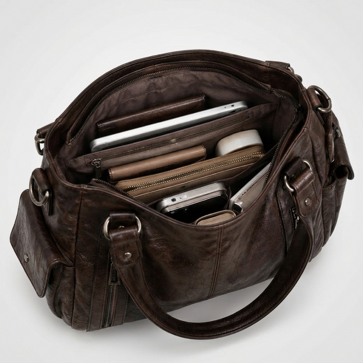 Czarna damska torba na ramię i crossbody, widok z boku, pojemna