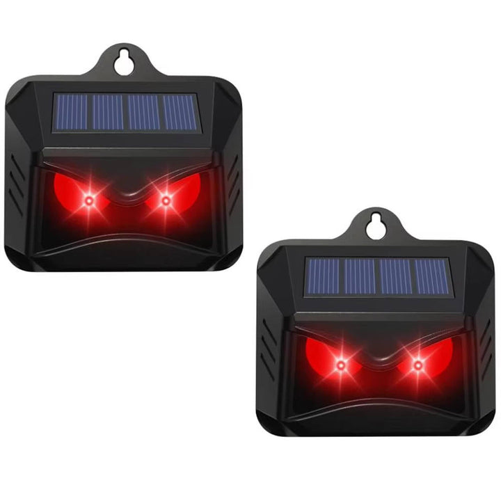Opakowanie z 2 solarnymi odstraszaczami ultradźwiękowymi. Ekologiczna ochrona ogrodu i działki przed zwierzętami.