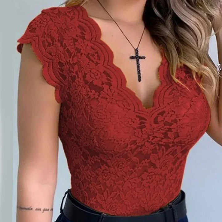 Modna bluzka damska bez rękawów, elegancki design z dopasowanym krojem. Idealna na wiele okazji. Top.