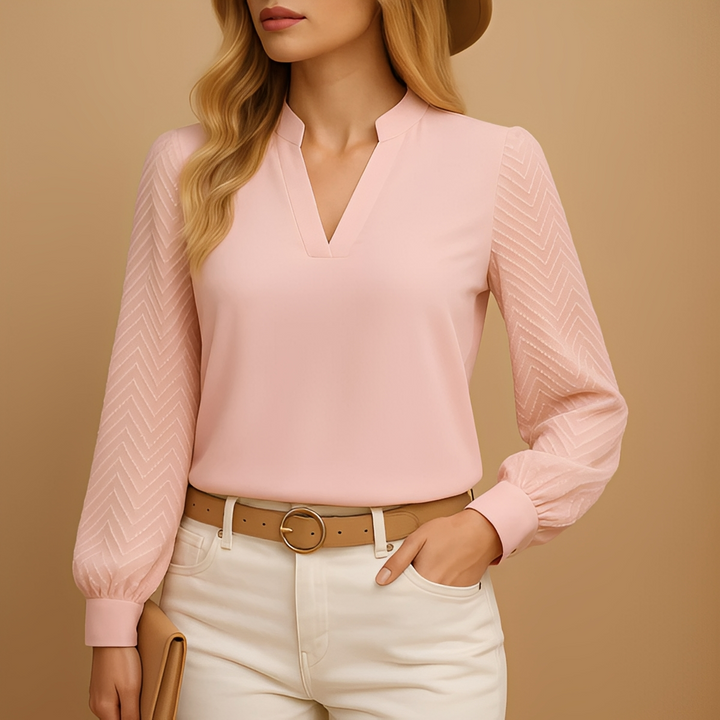 Modna bluzka damska z długim rękawem i dekoltem V. Stylowy top damski do pracy i na spotkania biznesowe.
