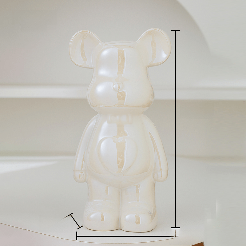Stylowa figura misia ceramiczna, podkreślająca elegancję wystroju wnętrz.