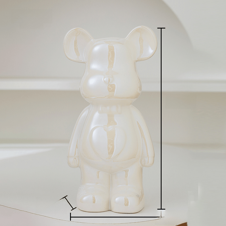 Stylowa figura misia ceramiczna, podkreślająca elegancję wystroju wnętrz.