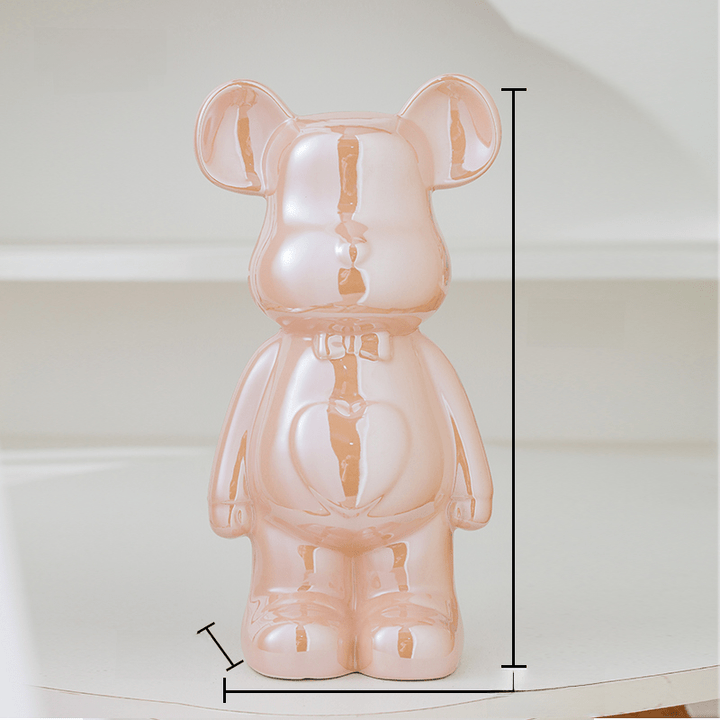 Nowoczesna ceramiczna figurka misia, idealna do kolekcji ozdób i dekoracji.