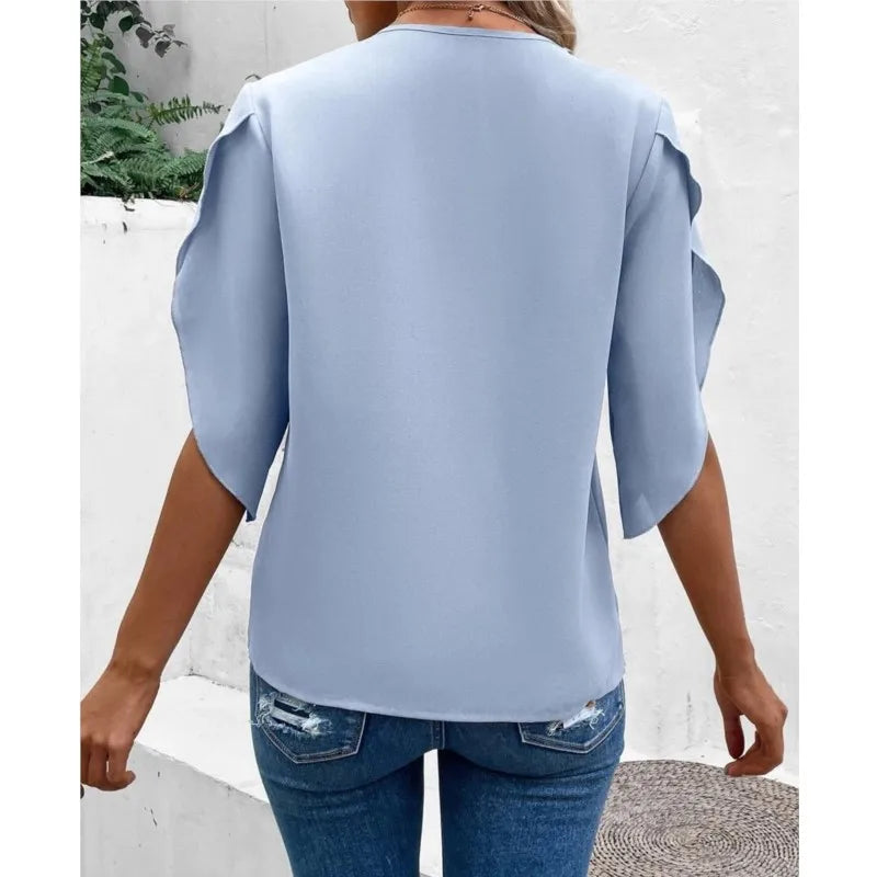 Wygodna damska bluzka z koronki z dekoltem V, idealna do codziennych stylizacji casual.
